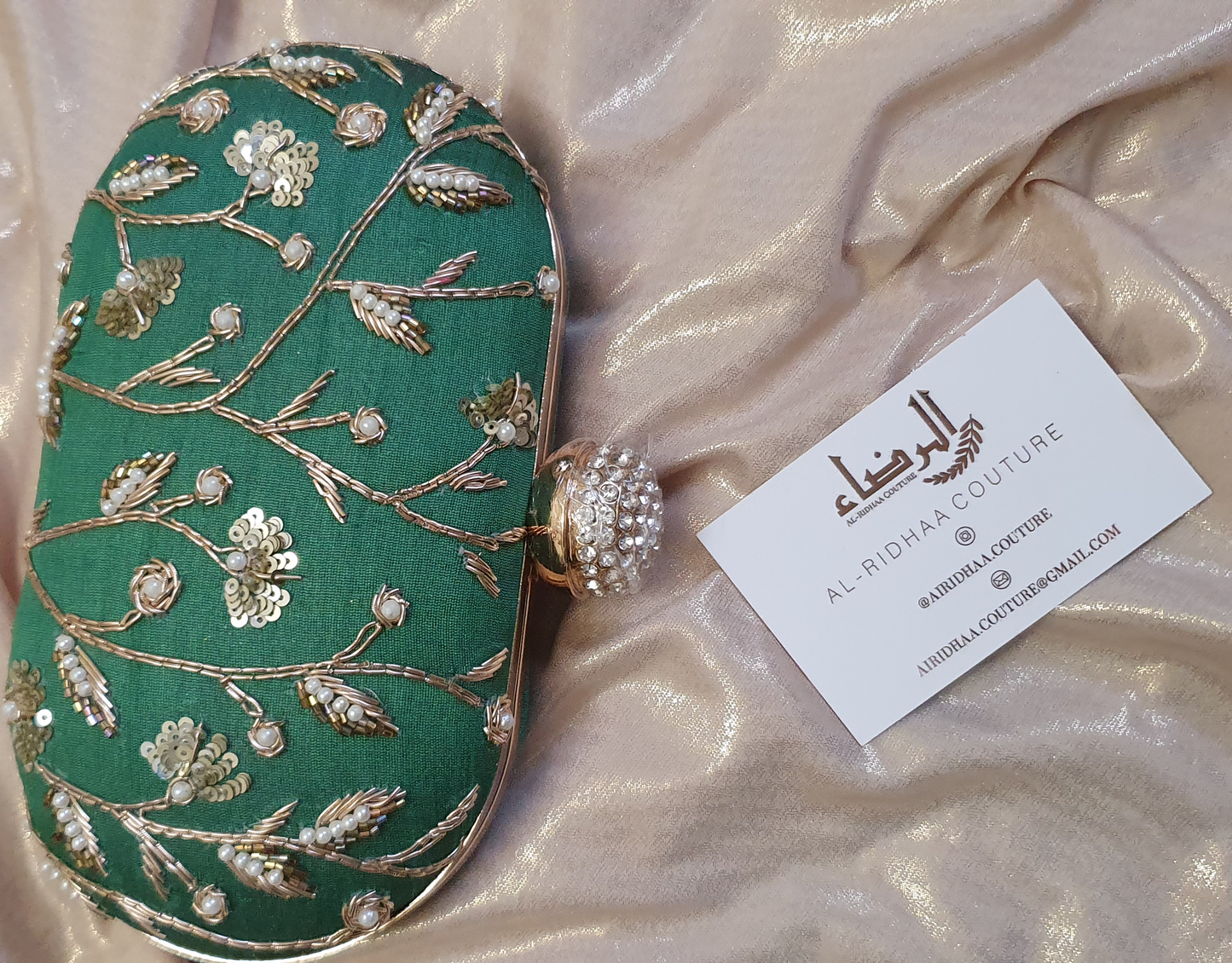 Small Oval Embroidered Clutch